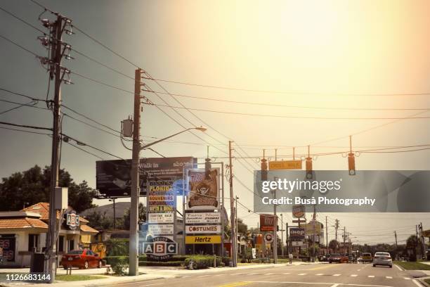 roadway in orlando, florida, usa - orlando florida buildings stock pictures, royalty-free photos & images