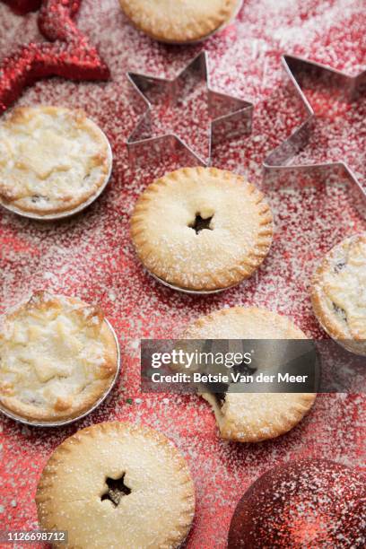 top view of still life of mince pies. - mince pie stock pictures, royalty-free photos & images