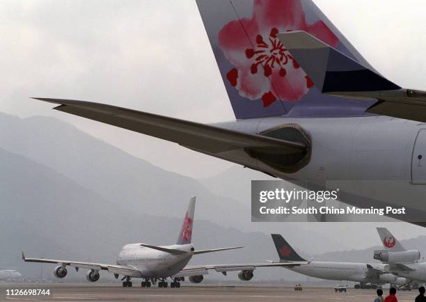 China Airlines aircraft parked at the Hong Kong International Airport in Chek Lap Kok. 26 January 2003