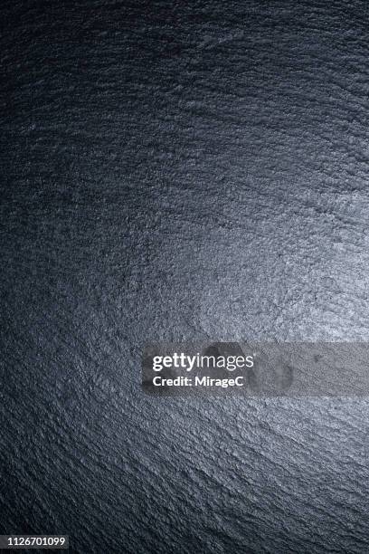 black shiny slate texture - schist stock-fotos und bilder