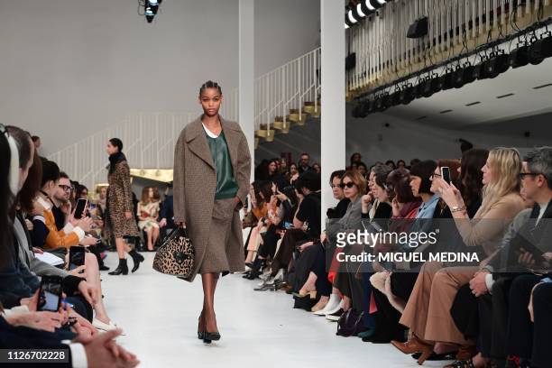 Model presents a creation during the Tod's women's Fall/Winter 2019/2020 collection fashion show, on February 22, 2019 in Milan.