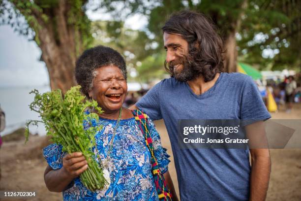 Kurdish Asylum seekers Behrouz Boochani, with one of his friends from the local people on Manus island. The human cost of Australias offshore...