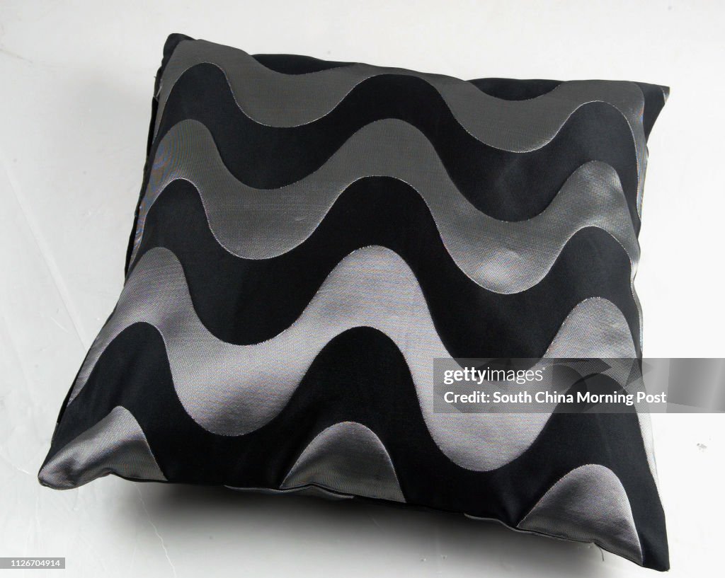 Polyester and viscose-mix wave cushion. 11 March 2003