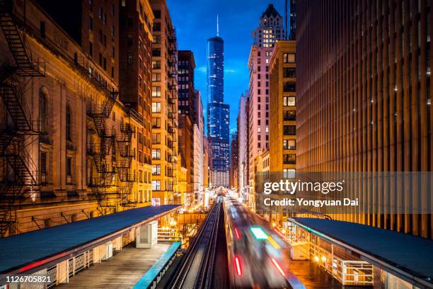 view of chicago loop at dusk - chicago landmarks stock pictures, royalty-free photos & images