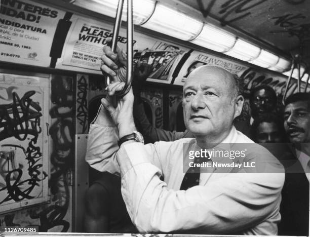 New York City Mayor Ed Koch rides the RR local subway train to Brooklyn, New York on August 2 on his way to watch kids from a summer jobs program...