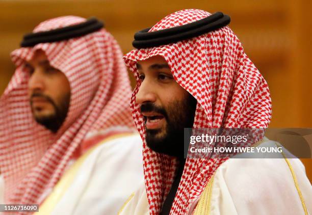 Saudi Crown Prince Mohammed bin Salman attends a meeting with Chinese President Xi Jinping at the Great Hall of the People in Beijing on February 22,...