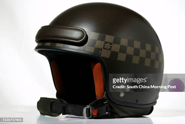 Helmet with Damier logo by Louis Vuitton. 12 MAY Fotografía de noticias -  Getty Images