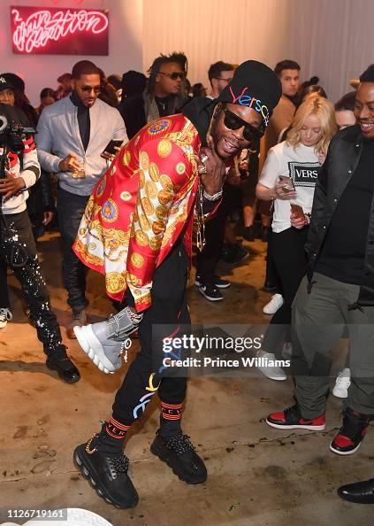 Rapper 2 Chainz attends 2 Chain Reaction a Versace Sneaker