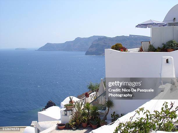 White Terraces And Mediterranean Sea View On Santorini Greece High