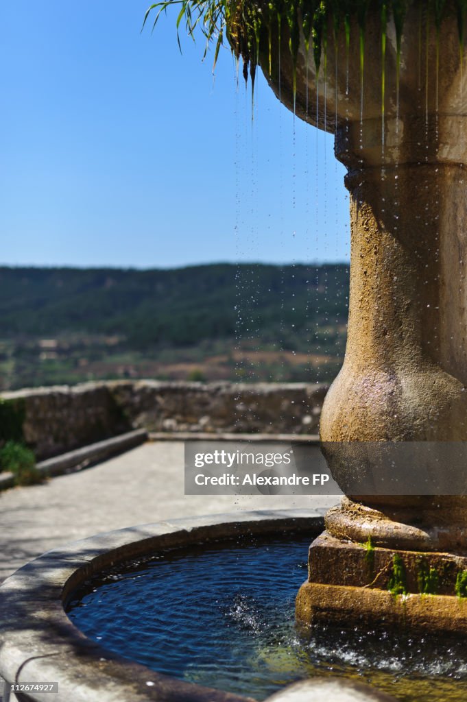 Provence stone fountain in moustiers