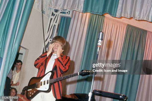 Brian Jones , a founding member of The Rolling Stones, plays a Gibson Firebird on stage at the Marine Ballroom on the Steel Pier, July 1 in Atlantic...