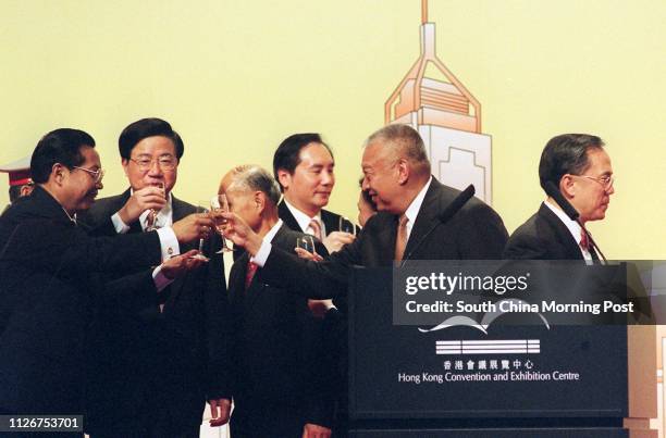 Ji Peiding , Jiang Enzhu , Henry Fok Ying-tung and Stephen Ip Shu-kwan toast with Tung Chee-hwa in the National Day cocktail reception at Hong Kong...