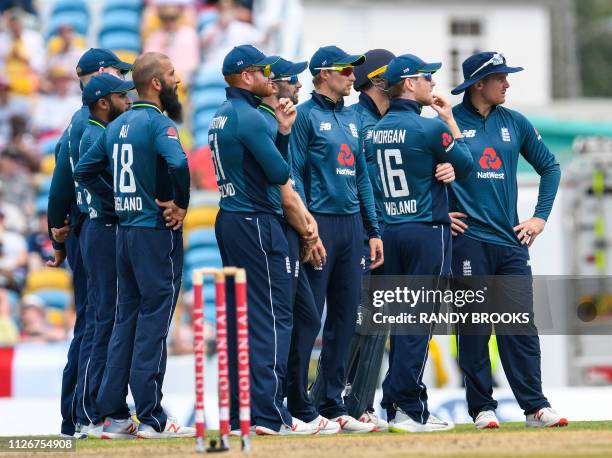 Moeen Ali , Jonny Bairstow , Joe Root , Eoin Morgan and Jason Roy of England watch a review during the 2nd ODI between West Indies and England at...