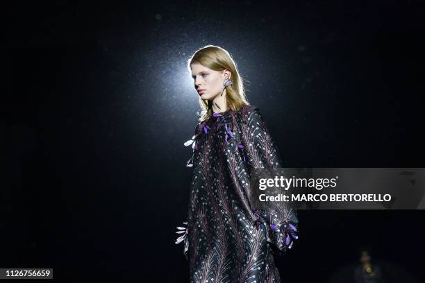 Model presents a creation during the Marco De Vincenzo women's Fall/Winter 2019/2020 collection fashion show, on February 22, 2019 in Milan.