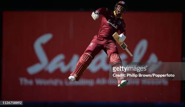 Shimron Hetmyer of the West Indies celebrates reaching his century during the second one-day international between the West Indies and England at...