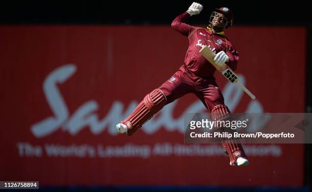 Shimron Hetmyer of the West Indies celebrates reaching his century during the second one-day international between the West Indies and England at...