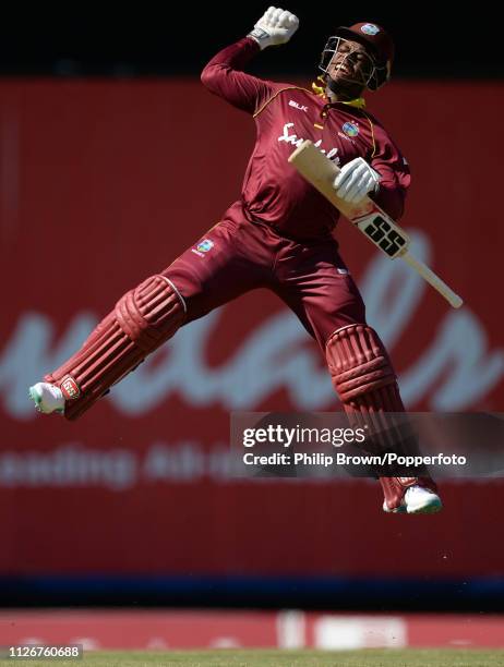 Shimron Hetmyer of the West Indies celebrates reaching his century during the second one-day international between the West Indies and England at...