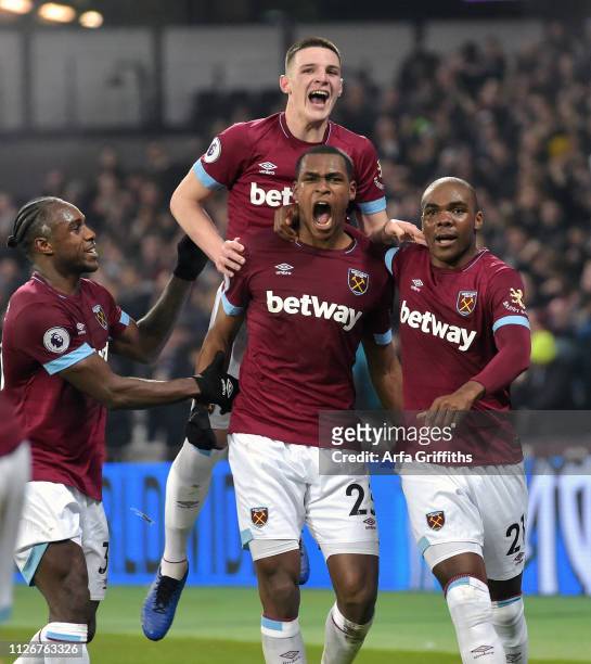 Issa Diop of West Ham United celebrates his goal with Angelo Ogbonna Declan Rice and Michail Antonio during the Premier League match between West Ham...