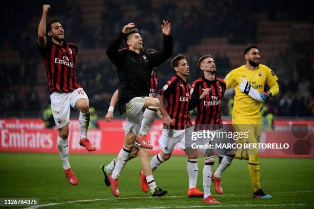 Milan's Turkish midfielder Hakan Calhanoglu, AC Milan's Polish forward Krzysztof Piatek, AC Milan's Spanish forward Samuel Castillejo and AC Milan's...