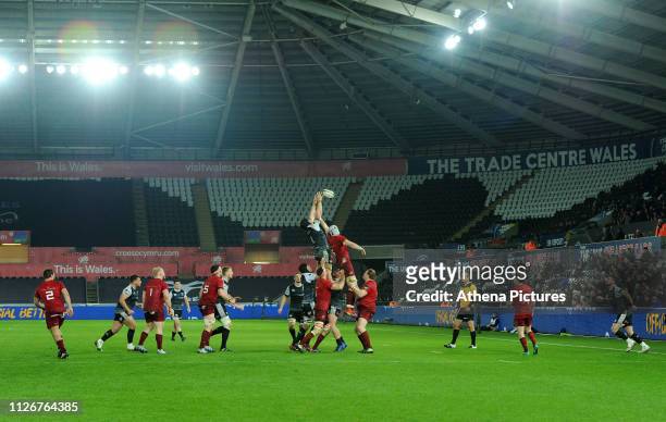 James King of Ospreys claims the lineout during the Guinness Pro14 Round 16 match between Ospreys and Munster Rugby at the Liberty Stadium on...