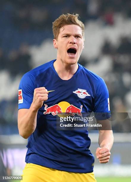 Marcel Halstenberg of RB Leipzig celebrates after scoring his team's first goal from the penalty spot during the Bundesliga match between Hannover 96...