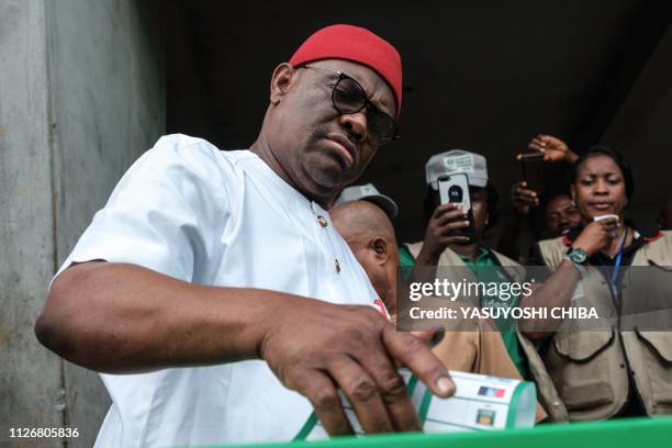 Rivers state's Governor Ezenwo Nyesom Wike casts his ballot as voting in the presidential and parliamentary elections on February 23 at a polling...