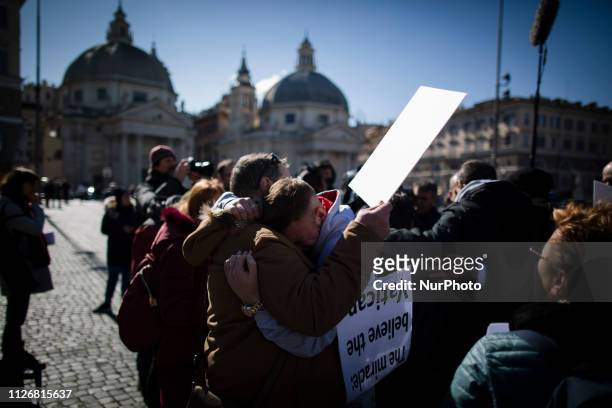 Sex abuse survivors and members of the ECA , hug each other during a march in downtown Rome on February 23, 2019. Eca is a global organization of...