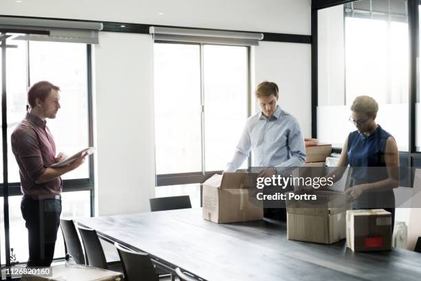 Stack Box Employee Stack Of Boxes In Office Photos and Premium High Res Pictures - Getty ...