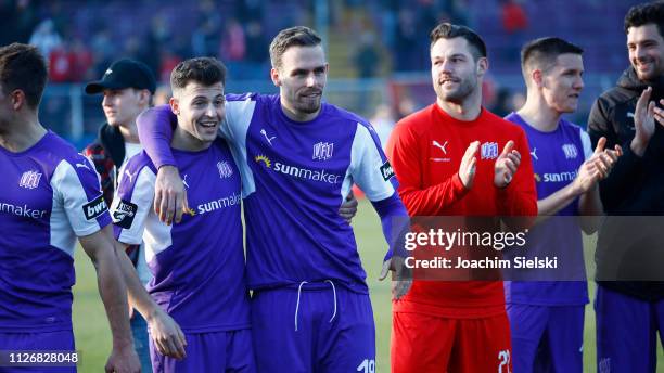 Kamer Krasniqi, Maurice Trapp and Philipp Kuehn of Osnabrueck after the 3. Liga match between VfL Osnabrueck and Hallescher FC at Stadion an der...