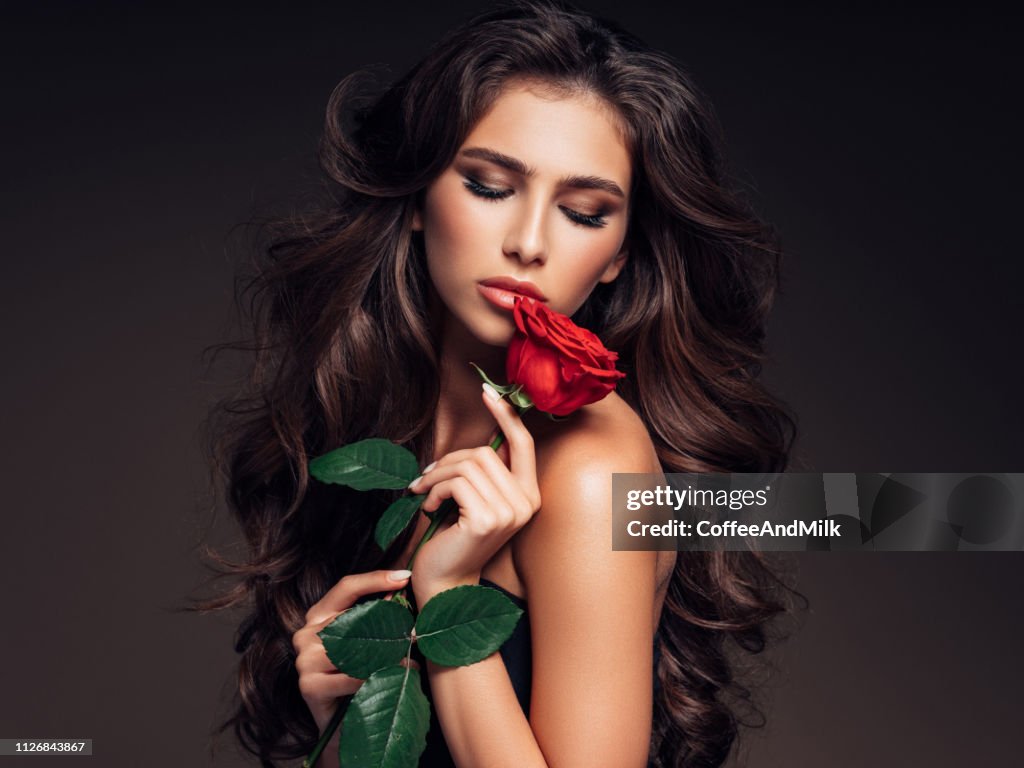 Brown Haired Woman With Curly Hairstyle High-Res Stock Photo - Getty Images Brown Haired Woman With Curly Hairstyle High-Res Stock Photo - Getty Images