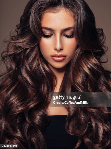 beautiful woman - wavy hair stock pictures, royalty-free photos & images