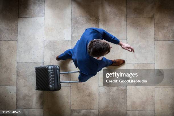 businessman on the move - airport from above stock pictures, royalty-free photos & images