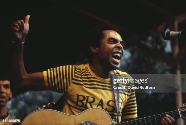 Gilberto Gil, Brazilian singer-songwriter and guitarist, during a live concert performance, circa 1982.