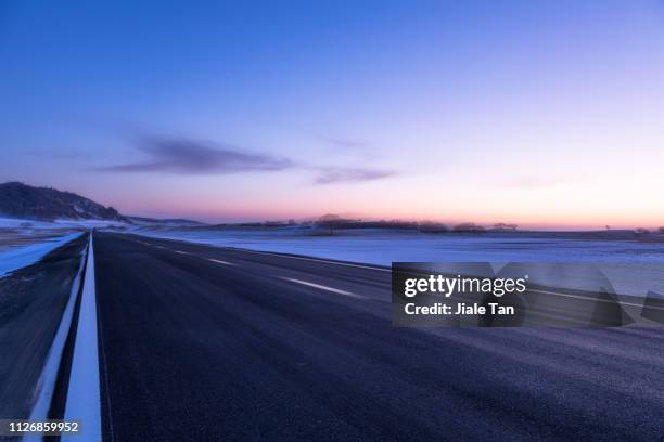 blurred motion mountain road at dusk, china - mountain road stock pictures, royalty-free photos & images