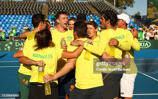 Alex de Minaur, John Millman, Jordan Thompson, John Peers, Alexei Popyrin, captain Lleyton Hewitt of Australia and their teammates celebrate after...