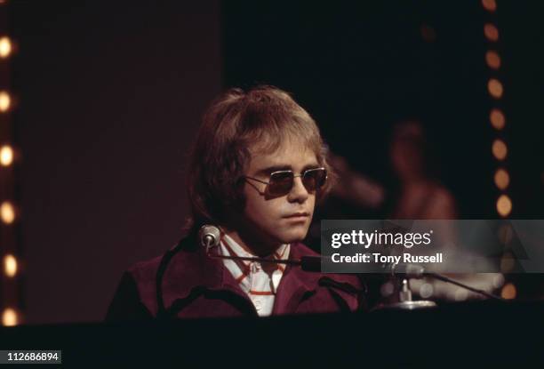 Elton John, British singer-songwriter, performing on the BBC television show Top of the Pops, London, England, Great Brtitain, April 1974.