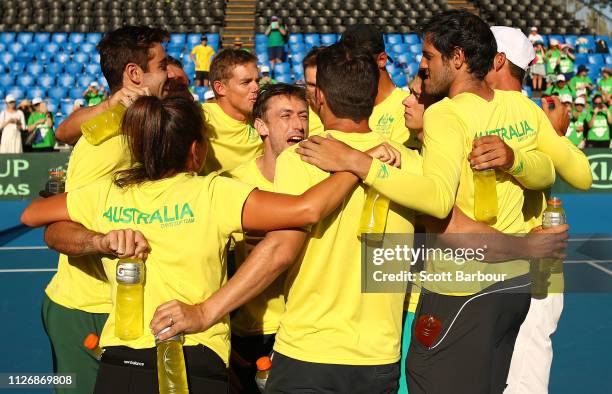 Alex de Minaur, John Millman, Jordan Thompson, John Peers, Alexei Popyrin, captain Lleyton Hewitt of Australia and their teammates celebrate after...