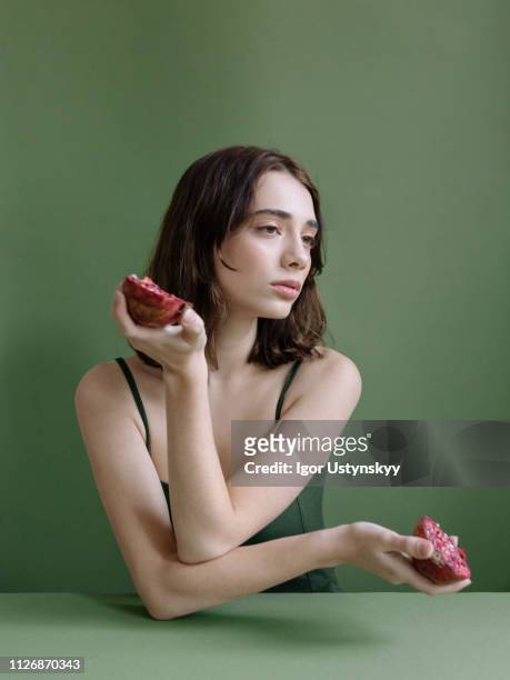 young woman posing in studio - fashion food stock pictures, royalty-free photos & images