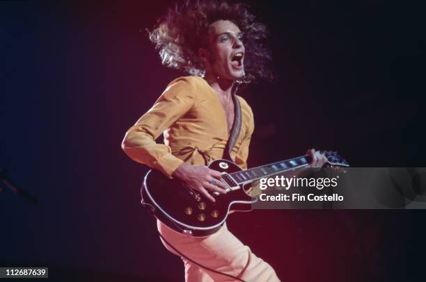 Peter Frampton, British musician and singer, playing the guitar during a live concert performance, circa 1975.