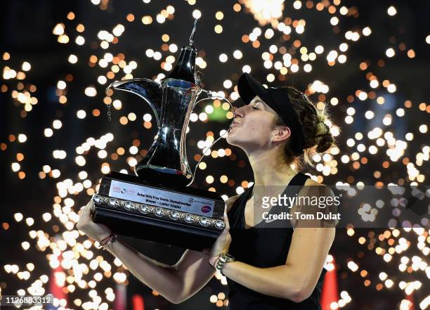 Belinda Bencic of Switzerland celebrates with the trophy after winning her Final Match against Petra Kvitova of Czech Republic on day seven of the...