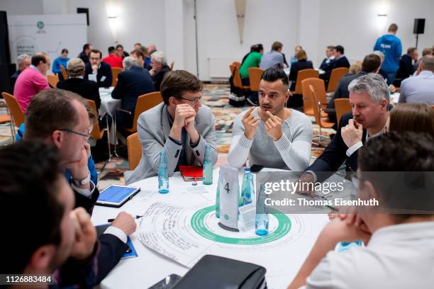 Delegates talk to each other during day 2 of the DFB Amateur Football Congress at Hotel La Strada on February 23, 2019 in Kassel, Germany.