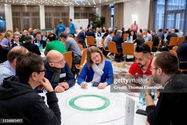 Delegates talk to each other during day 2 of the DFB Amateur Football Congress at Hotel La Strada on February 23, 2019 in Kassel, Germany.