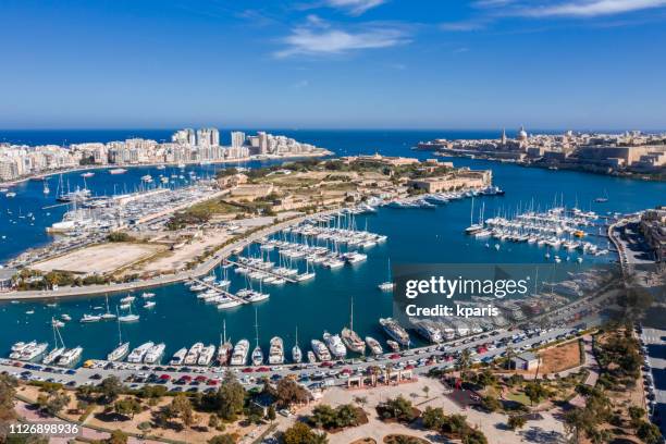 valletta, manoel island, ta xbiex yacht marina, malta. drone aerial photo - malta harbour stock pictures, royalty-free photos & images