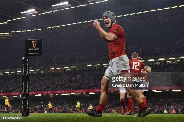 Jonathan Davies of Wales celebrates his sides second try during the Guinness Six Nations match between Wales and England at Principality Stadium on...
