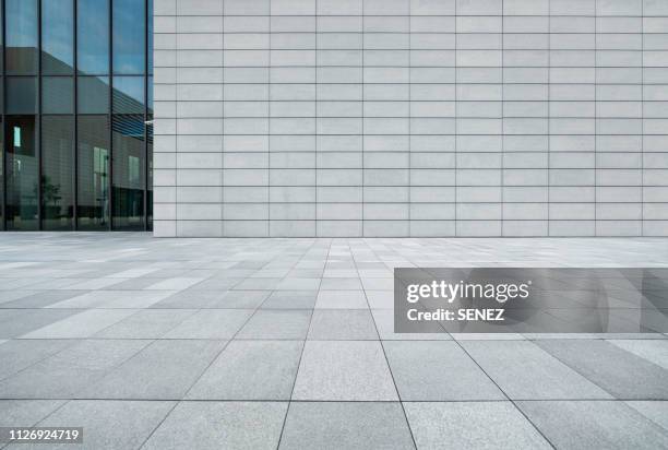 empty studio background - tiled wall stock-fotos und bilder