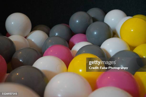 ball pool - kugelform stock pictures, royalty-free photos & images