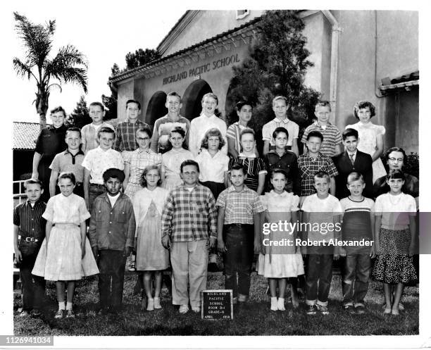 The sixth grade class at Highland Pacific Elementary School in Highland, California, pose for a group portrait in 1958. The group includes only one...