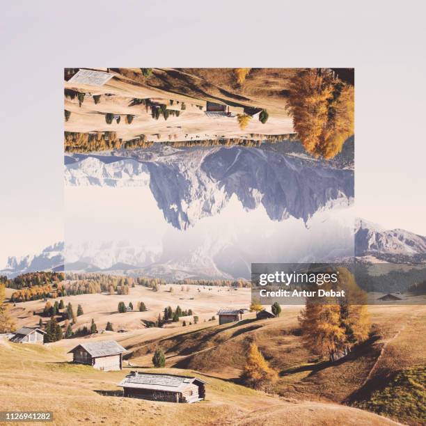 creative geometric landscape manipulation with reflection in the italian alps. - reversing stock pictures, royalty-free photos & images