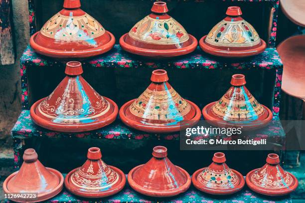 small terracotta tajine (tagine) souvenirs, morocco - tajine stock pictures, royalty-free photos & images