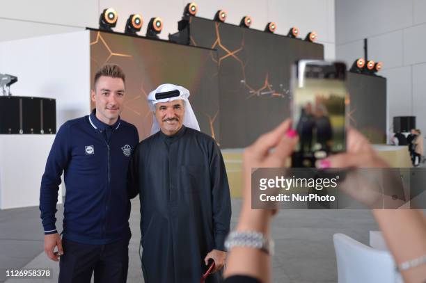Elia Viviani of Italy and Team Deceuninck-QuickStep, posses for a picture with H.E. Saeed Hareb, Secretary General of Dubai Sports Council , inside...